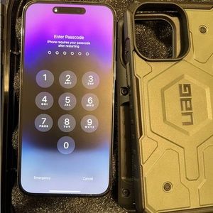 Unused iPhone 14 pro max purple with two cases + screen protector